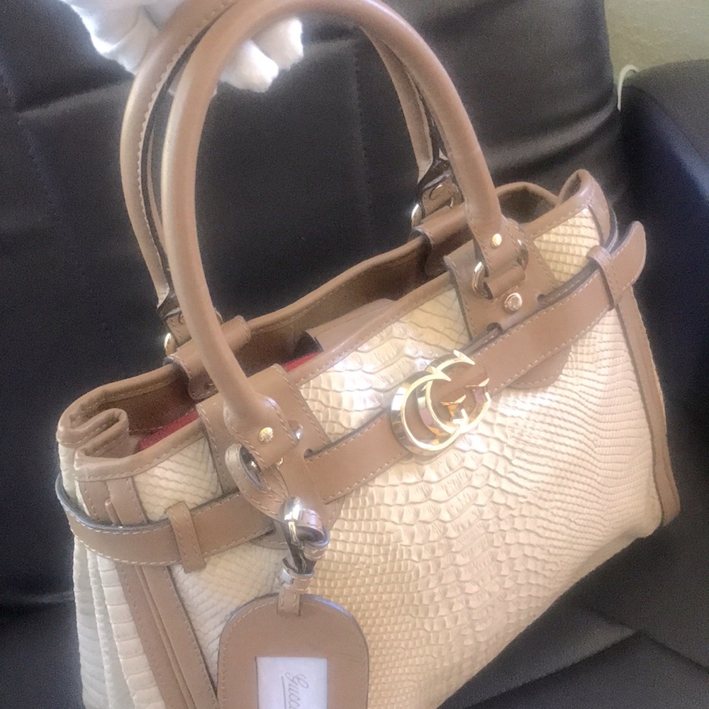 - Gucci satchel snake leather hand bag made in Italy